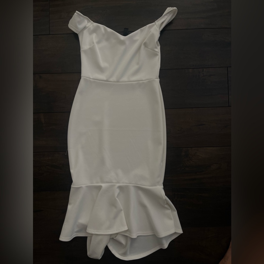 White body con ruffled dress.